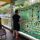 Passers-by read notes left by people at a Lennon Wall in Fanling, a northern suburb of Hong Kong.